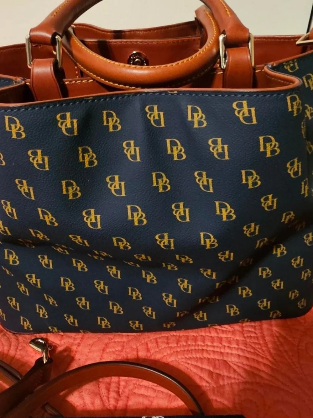 Pre-owned. Price Is Firm -Dooney & Bourke Navy and Gold Signature Tote
